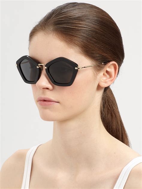 miu miu sunglasses black &|Miu Miu eyeglasses.